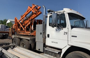 1995 FL-80 Sterling B-7 Post Driver Truck with Pressure Digger, Remote Drive Tandem Axle