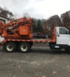 USED Tandem Axle GRT Post Driver WITH AUGER
