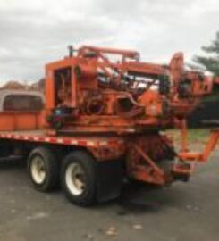 USED Tandem Axle GRT Post Driver WITH AUGER