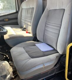 1995 FL-80 Sterling B-7 Post Driver Truck with Pressure Digger, Remote Drive Tandem Axle