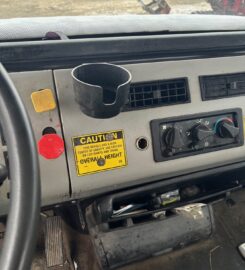 1995 FL-80 Sterling B-7 Post Driver Truck with Pressure Digger, Remote Drive Tandem Axle